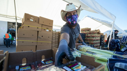 HIgh Desert Second Chance volunteers sort and deliver food to families in need during their giveaway in Hesperia CA on Saturday April 25, 2020. [James Quigg, For the Daily Press]