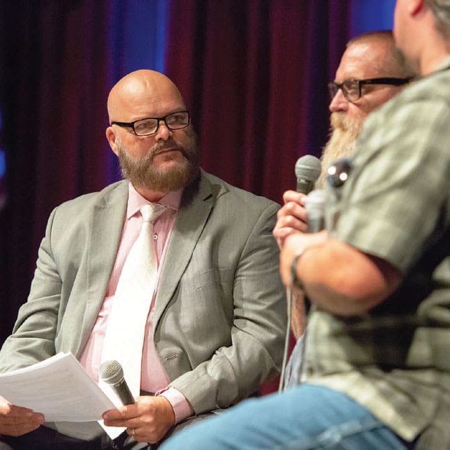 director of victor valley rescue mission on stage